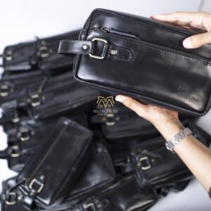 souvenir perusahaan clutch kulit asli
